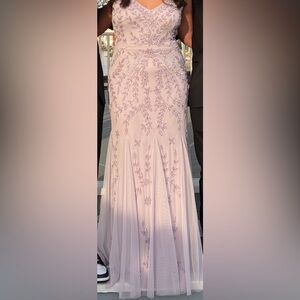 A light lavender, maxi dress by the brand Marina. In perfect condition.